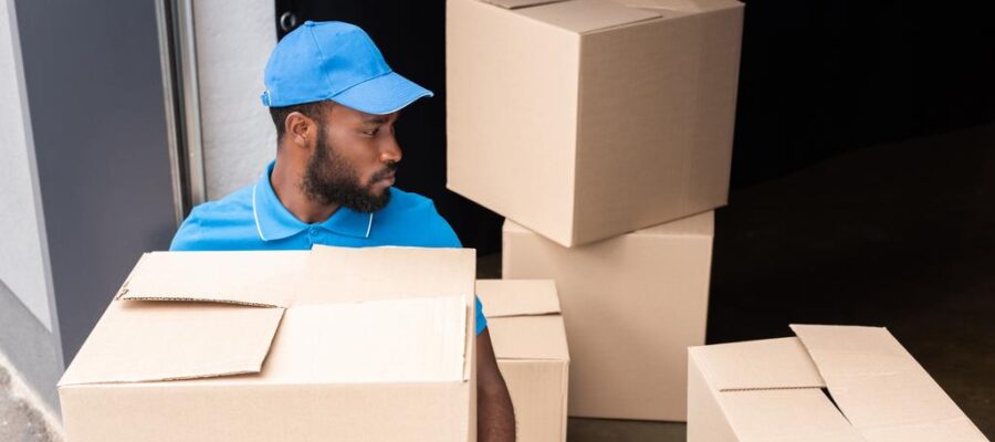 delivery-man-holding-box-storage